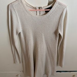 Cream colored long sleeve sweater dress.